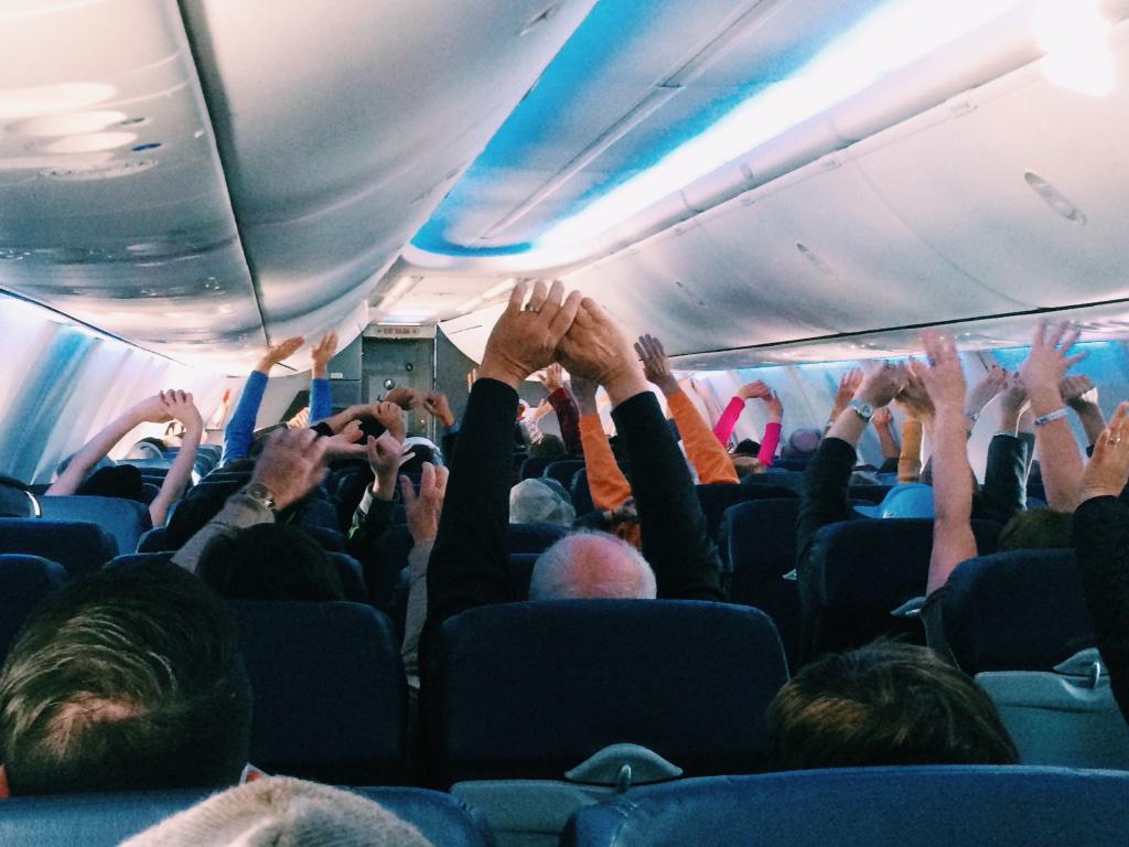 shockthomas's tweet image. Our @SouthwestAir flight attendants just led the plane in some in-flight yoga.
Not even kidding.