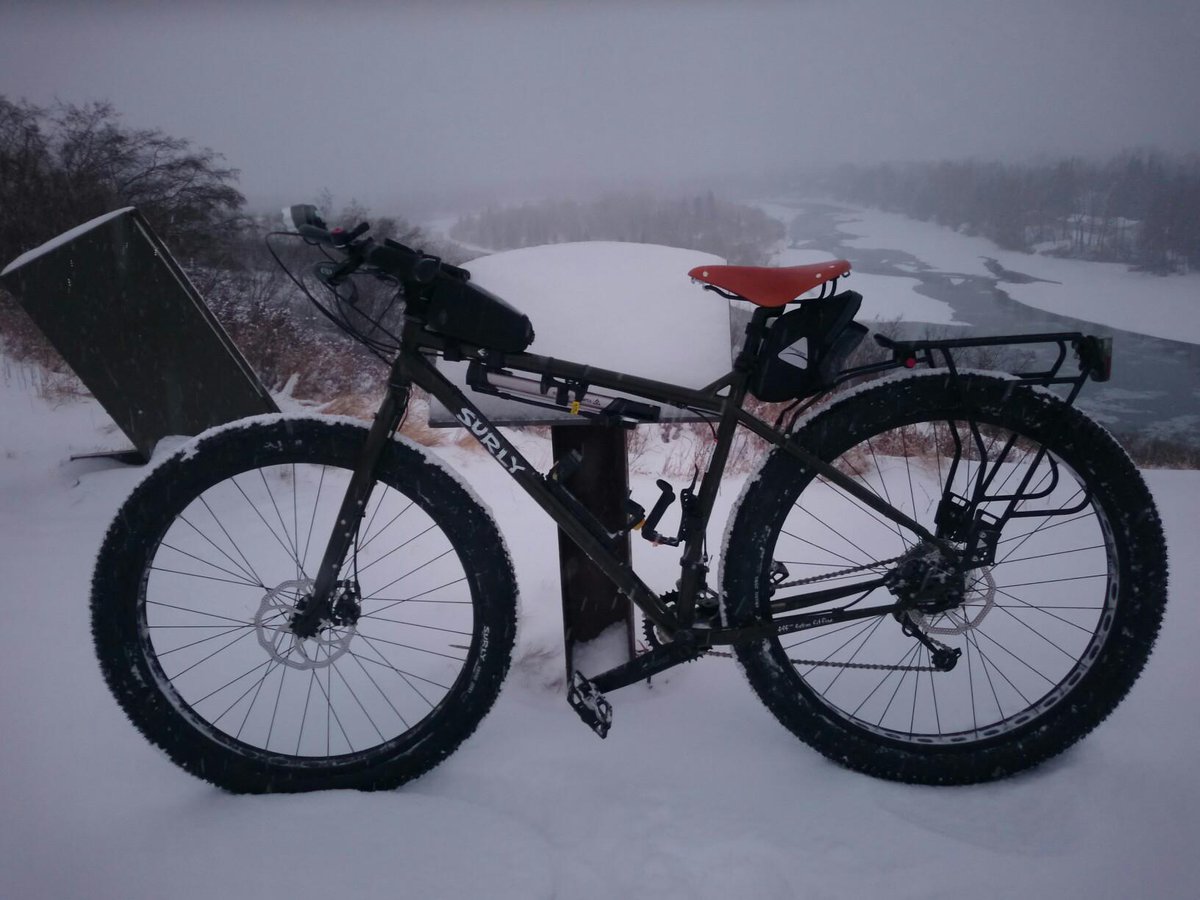 Snowy #yycbike ride home to Tuscany tonight. Very glad to be riding my new "chubby"-tire bike. Thanks Santa!