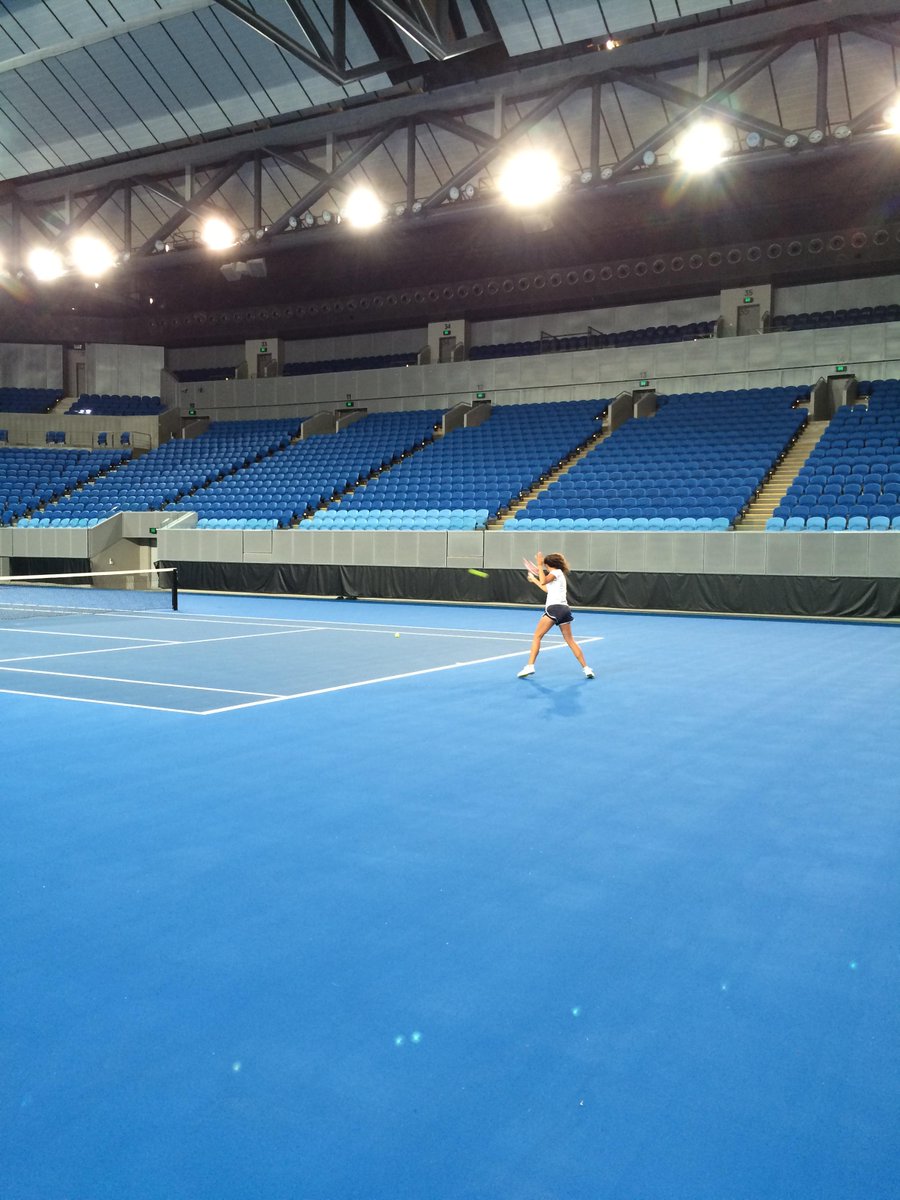 National academy juniors enjoy a hit on the new Margaret Court Arena