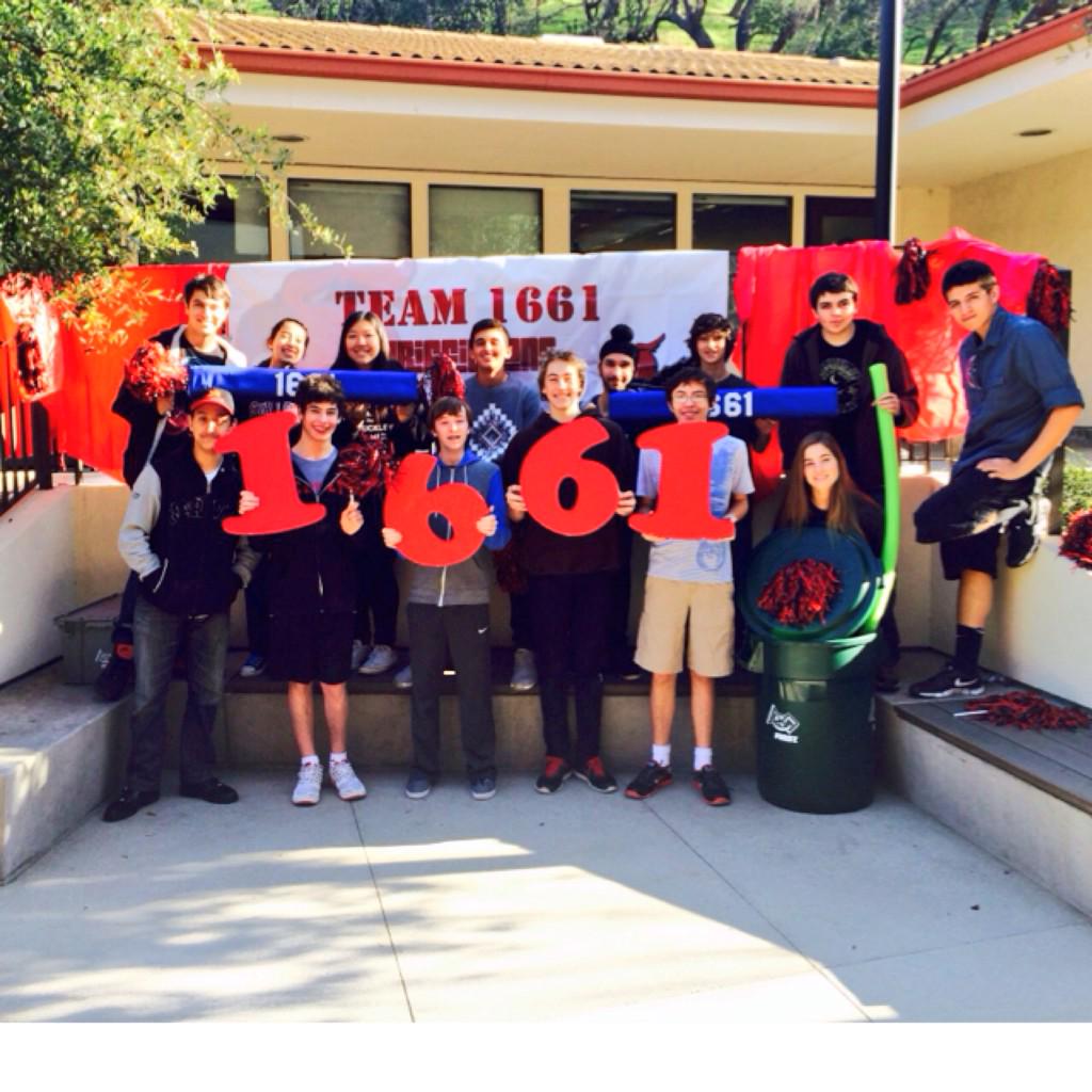 1661 Team photo with our game pieces! So excited 2 start building for #RecycleRush #OMGrobots #FedEx #FRC1661Contest