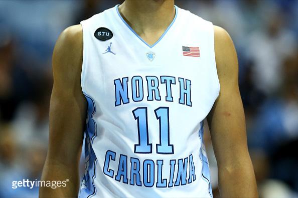 GettySport's tweet photo. Beautiful tribute by the @UNC_Basketball fans and players to #StuartScott. #Scott is a @UNC alum. #AlwaysATarheel http://t.co/AdWnrnFhfT