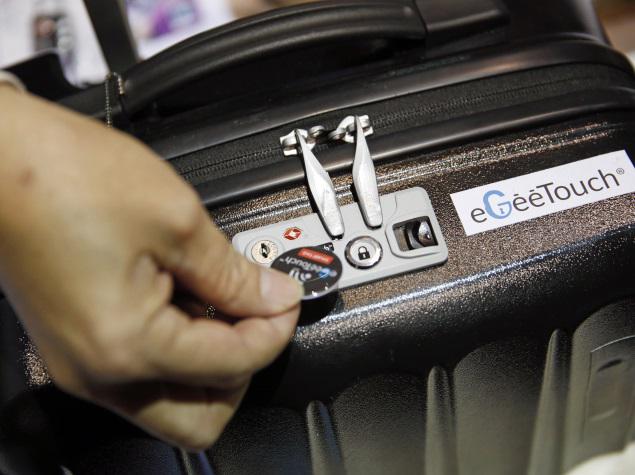 TecheFuture's tweet photo. #Launched #eGeeTouch Smart Lock Can Open, Lock Suitcases via Smartphone. Read More: http://t.co/NXfD6aHrli http://t.co/wSZe1gBlhe