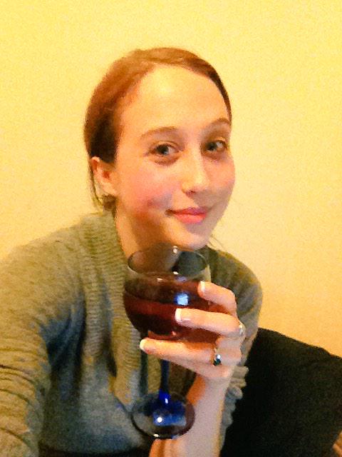 A glass of wine and bed. Actually this is glass 4, but semantics. And look I found my dimple! http://t