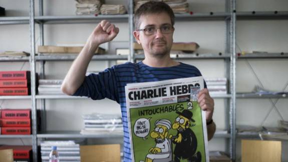 JethroBean1's tweet image. “Id rather be standing up than live on my knees.” motto for leading cartoonist Charb #CharlieHebdo #IWILLNOTSUBMIT