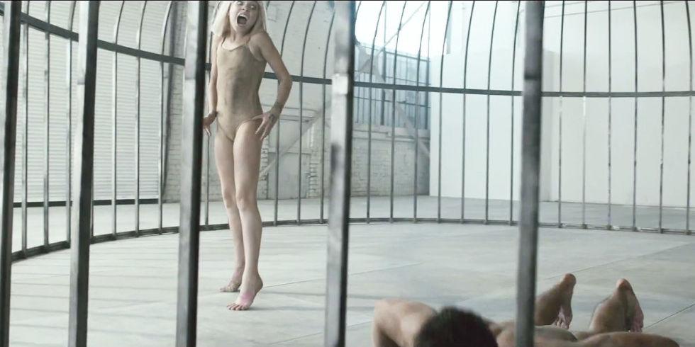 Sia's WILD new video traps the dancer from 'Chandelier' in a...