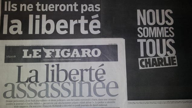 franceinfo's tweet photo. #CharlieHebdo | la presse française en deuil ce jeudi matin http://t.co/yxUFQuAK3J