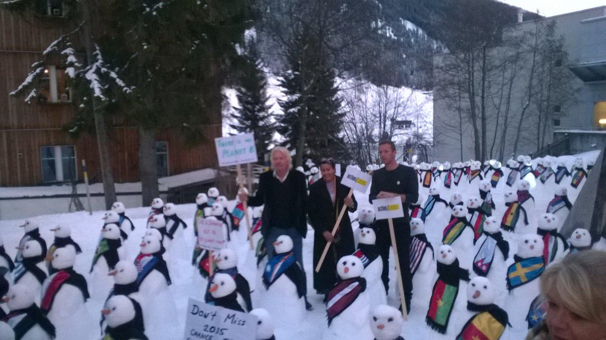 Army of #action2015 zombie snowmen storm Davos demanding action on climate, poverty &amp; inequality. #wef15