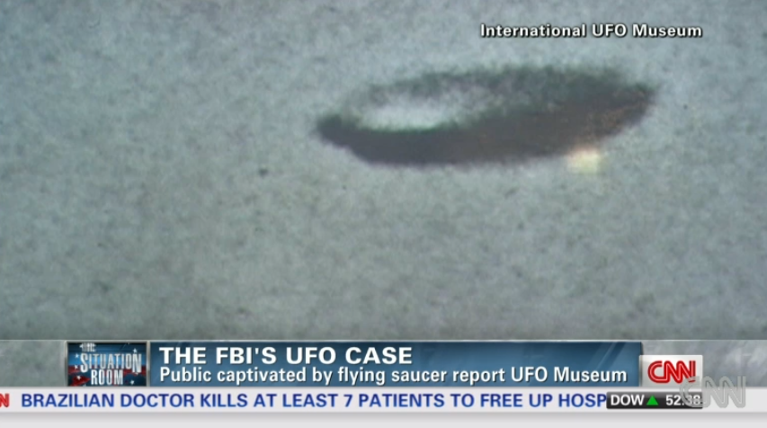 CNN's tweet photo. Nearly 130,000 pages of declassified files on #UFO investigations and sightings are now online http://t.co/fGEHAwPNpK http://t.co/qdNULd9nh8