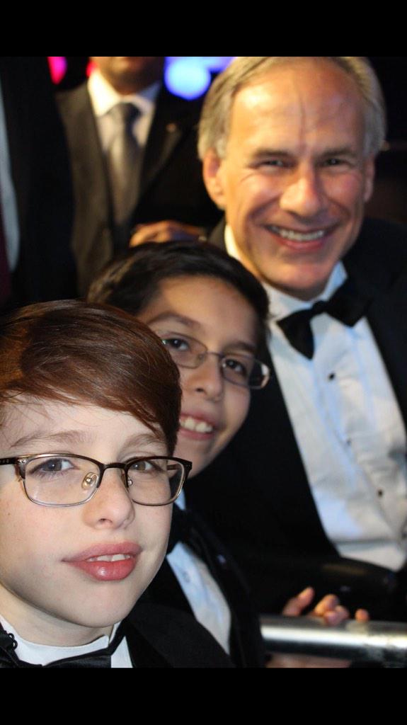 AdryanaAldeen's tweet photo. #TX Gov @GregAbbott_TX with young guests Ivan and Nicolas Andarza @Andarzalaw #txlege #txInauguration #InauguralBall http://t.co/JSbvt2GJPB