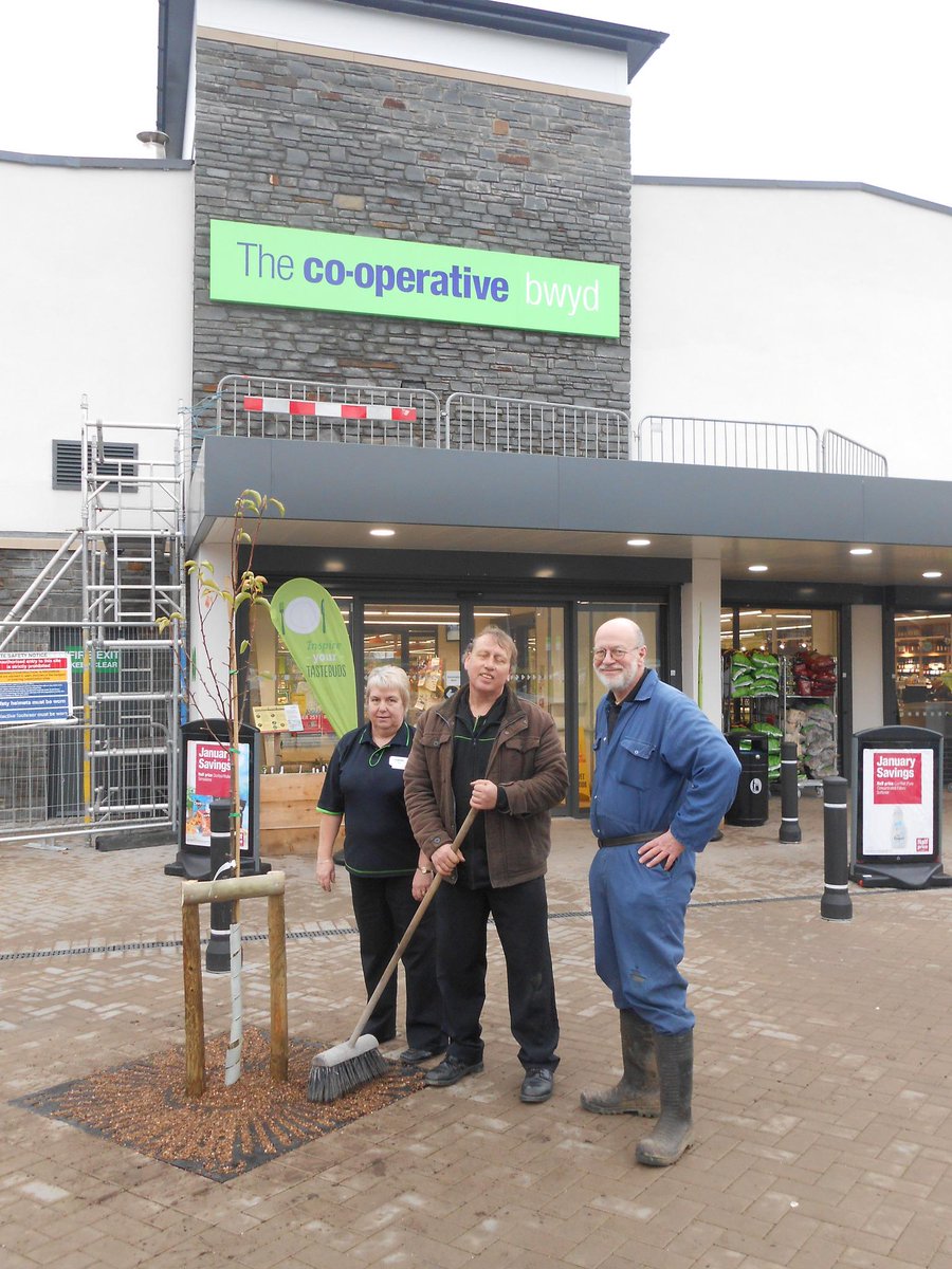 Debcoopmemb's tweet photo. Pear tree planting @CooperativeFood #machynlleth today, #goodgrowing staff &amp; Co-op Membership @CoopCymruWales http://t.co/EJSQ9Bhy1a