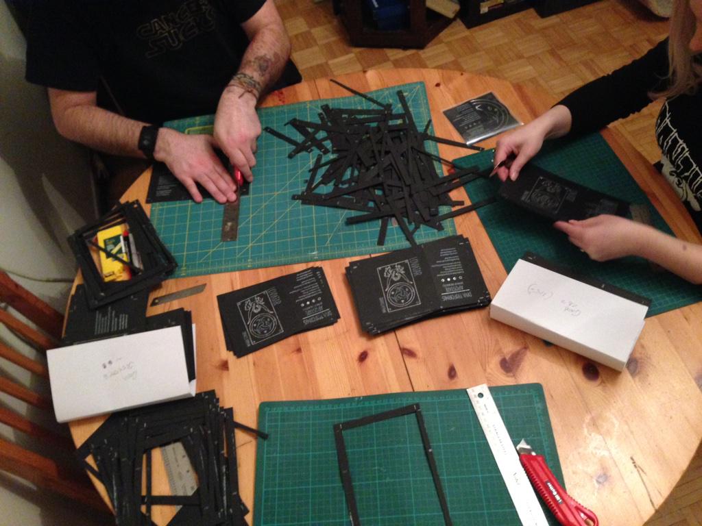 LoviatarDoom's tweet image. Assembling the limited edition CD's and tapes for the release party this Saturday! #divashymn #thisisalotofwork