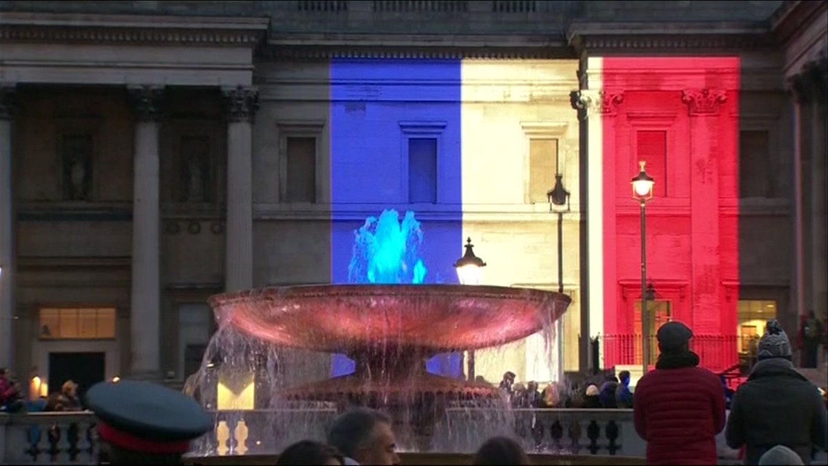 Cheers from crowd in London's Trafalgar Square as French tricolore lights up National Gallery bbc.in/1DxNLQD