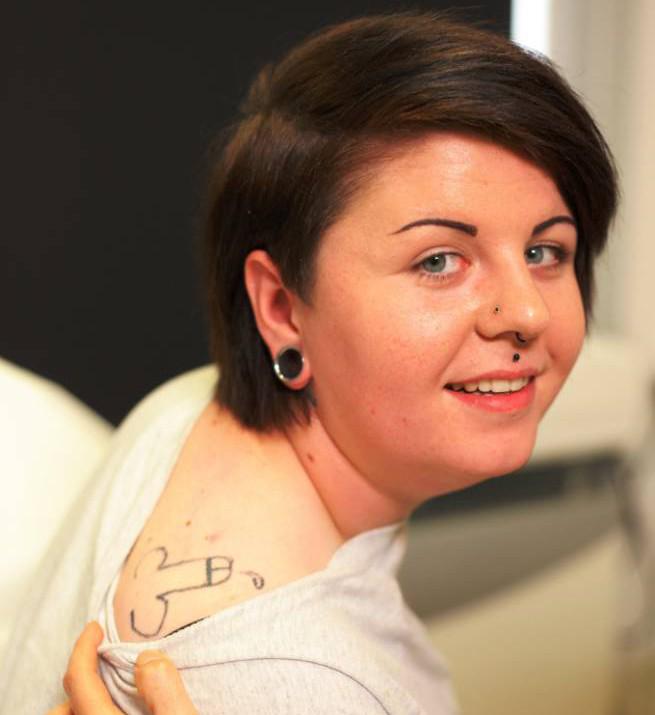 MetroUK's tweet photo. Woman woke up after drunken party with penis tattoo on her shoulder http://t.co/fLb9z8eUfI http://t.co/Pe4DDJcJPf