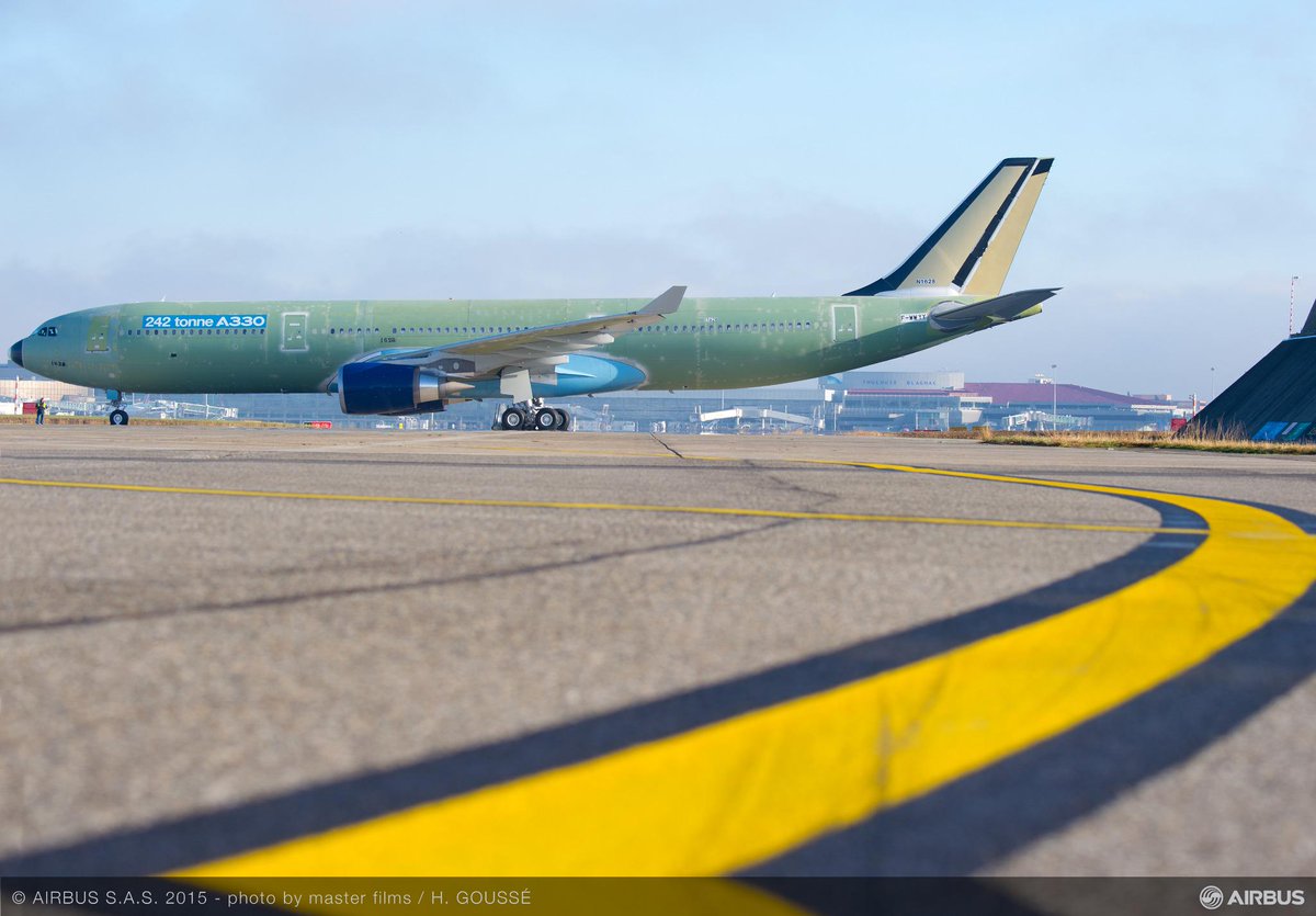 Airbus's tweet photo. The first 242 tonne take-off weight #A330 just completed its first flight http://t.co/tZzq5xJAkJ http://t.co/VPXfECxMnh