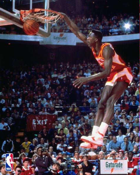 Happy birthday to the human highlight real Dominique Wilkins. I had this poster of him on my door as a kid 