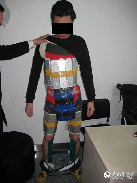 verge's tweet photo. This is how you (attempt to) smuggle 94 iPhones into China http://t.co/YeRBSE9bNi http://t.co/BcZjdPLnb4