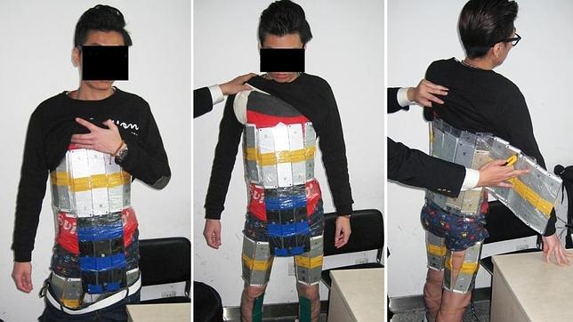 abc_es's tweet photo. Un i-contrabandista intentó cruzar la frontera con 94 iPhones pegados al cuerpo http://t.co/B2cjqCj1zz http://t.co/TU4N3gjPSb