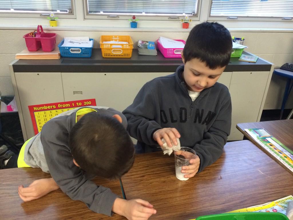 Student had a great time separating mixtures of salt and gravel by creating a sieve.