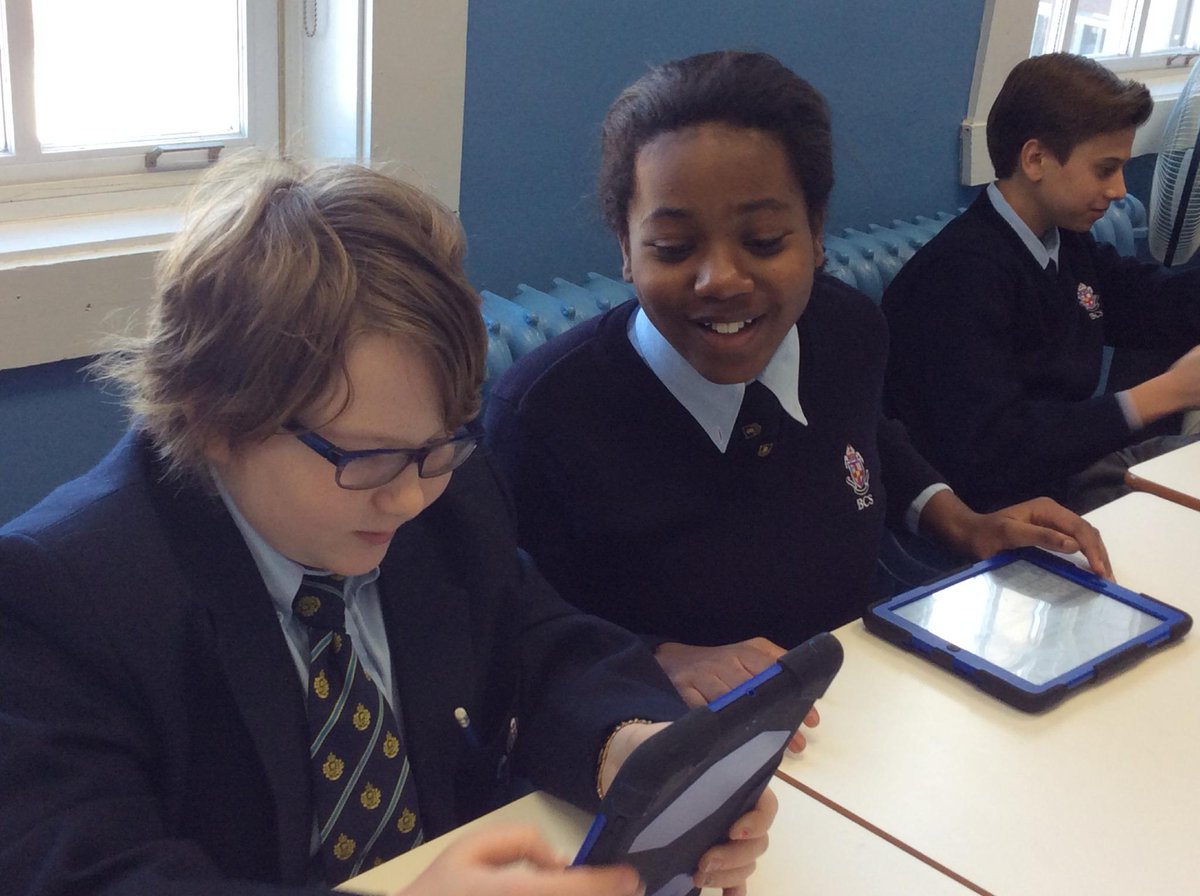 Izzy and Edith having fun working with their iPads in Mrs. Carey's class #ipad #edtech