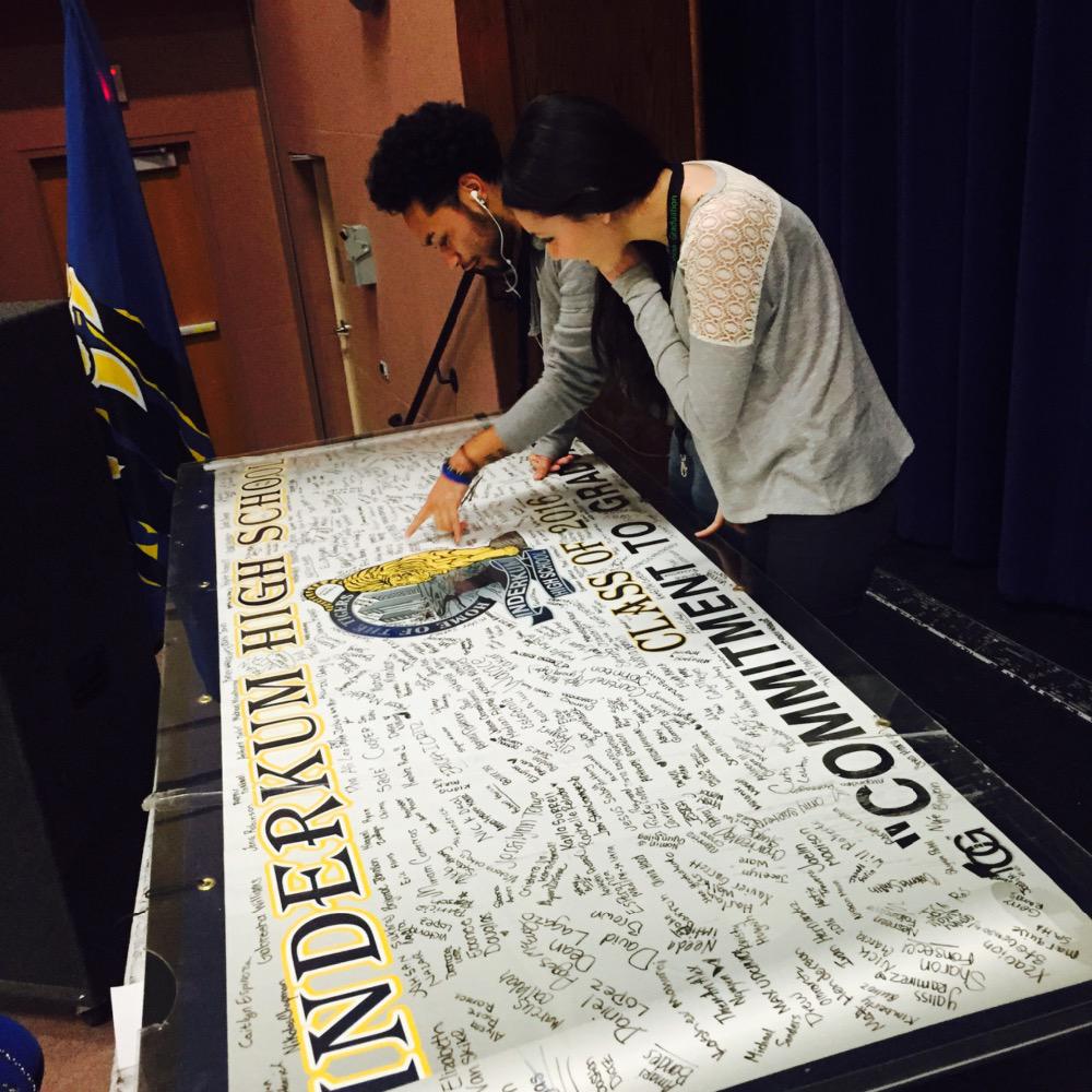Students searching for their name on the class of 2016 C2G banner. "Almost there" <a href="/GoTigersGrowl/">Scott Pitts</a> <a href="/natomasbuzz/">The Natomas Buzz</a>