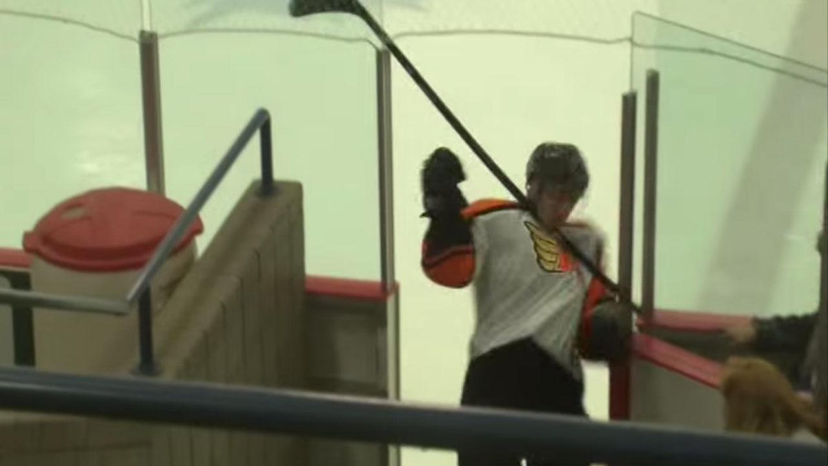 Sportsnet's tweet photo. Hockey Fail of the Year: Player gets ejected, has trouble leaving ice, clotheslines himself. http://t.co/kt1v8GXEmX http://t.co/lZKK1edvqa