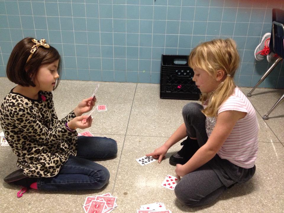 Guy726's tweet photo. DES first graders practicing their math skills with a card game. #ycsd14 http://t.co/c9S2e5ikpN