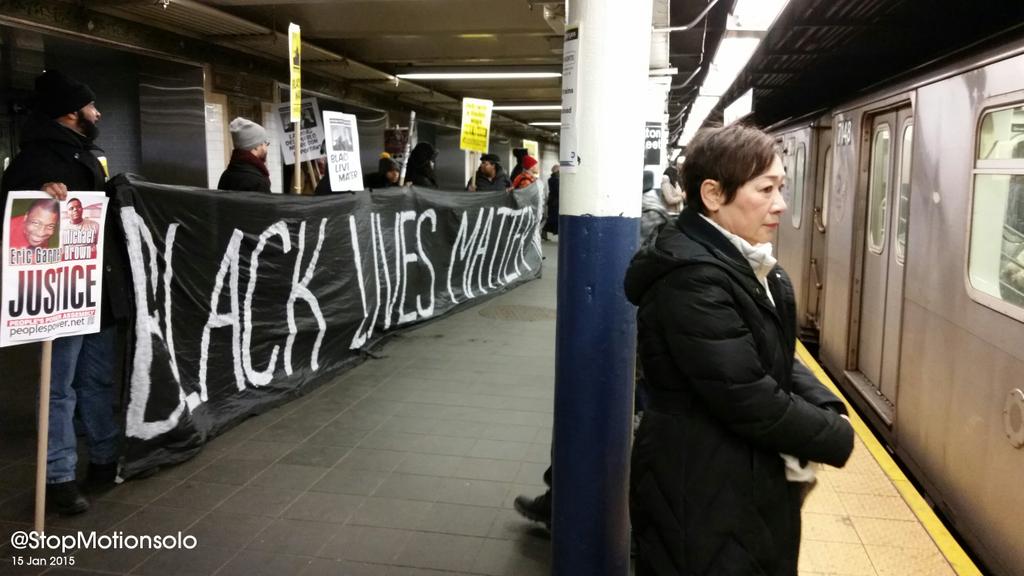 StopMotionsolo's tweet photo. #BlackLivesMatter greets strap hangers at Fulton Street station. #J15MLKStrike #MLKStrike #MLKDay2015 #NYC4MLK http://t.co/uax4PQt6TL