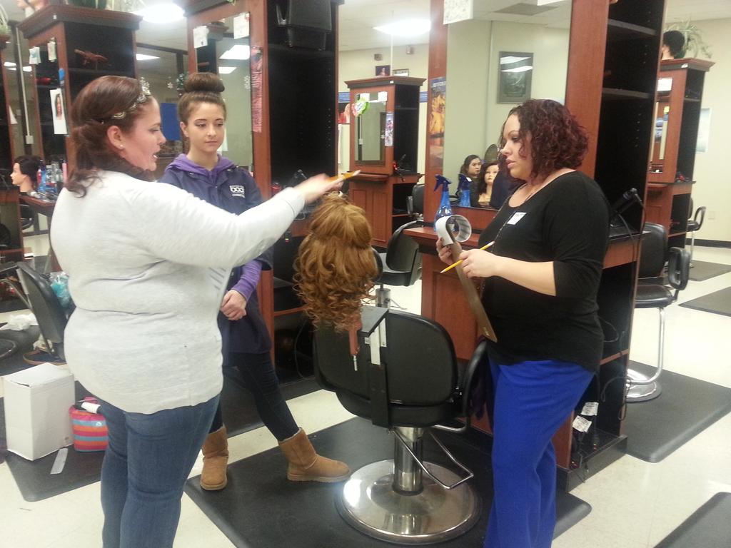 Junior Cosmetology run off. Judges and former students Brenda Bunzey and Toni Gordner.