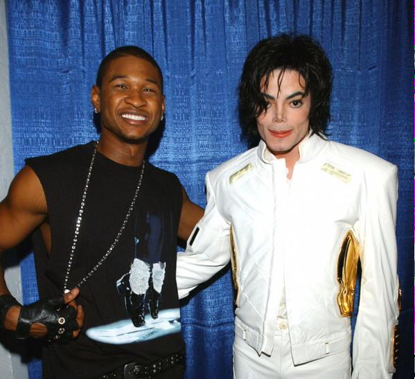 Usher's tweet photo. Still the King 👑 #RIPMJ #TBT http://t.co/Jg1k9cbPC6