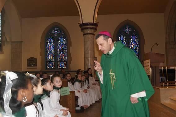 Saint James School celebrated their faith with a visit from Bishop Caggiano today.