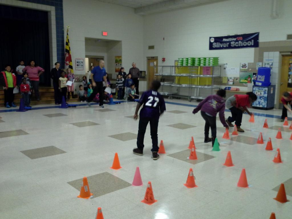 PennyFGerman's tweet photo. PE teacher Mr. Ostrom is demonstrating how to combine movement with vocabulary. http://t.co/ogaQ10l8z2