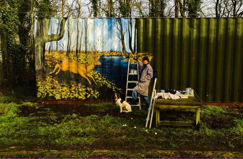 JaniceStubbs3's tweet photo. Making our container blend into the environment! #Art #outdoors http://t.co/A7JGbRNe5r