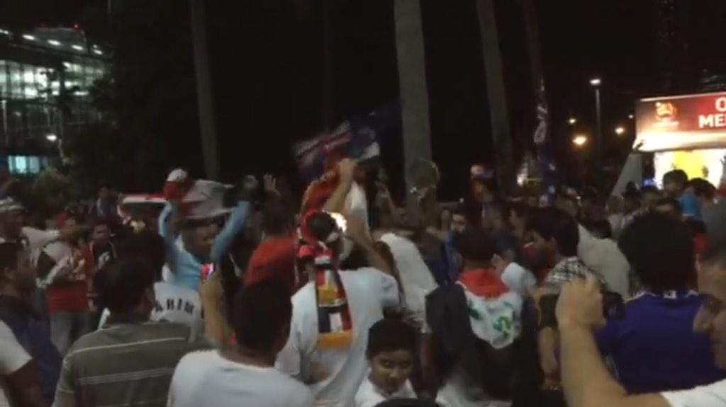 Iraqis celebrating after loss to Japan.Aussie fan:"this is y despite violence+terrorism Iraqis still a strong nation"