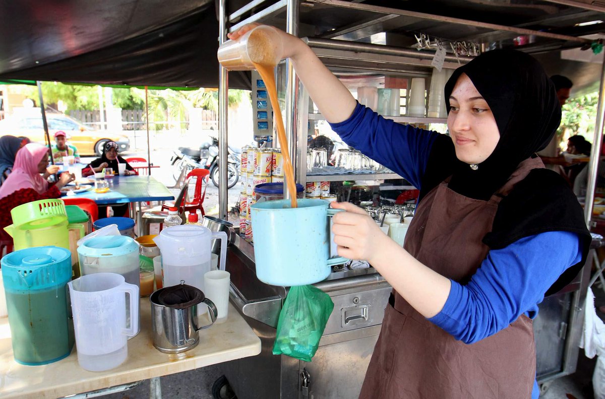NST_Online's tweet photo. Roti canai served by Italian student Chantal a hit in Alor Star http://t.co/6SzIQEhQhO http://t.co/sSV468hgrU