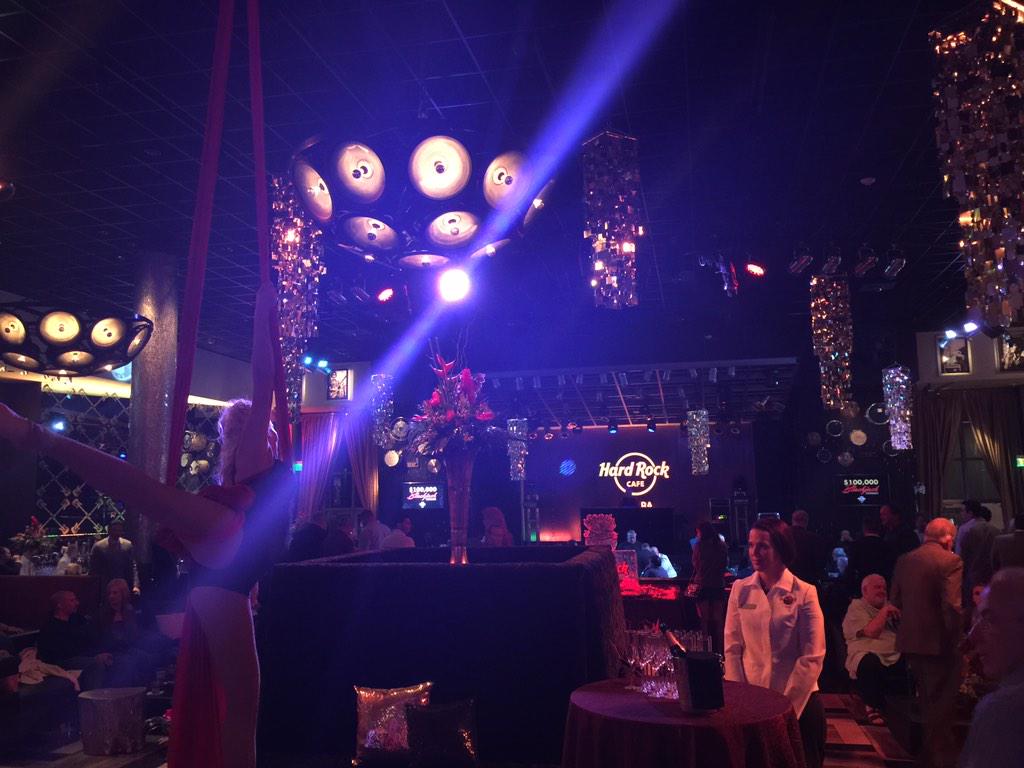 DSeaG45's tweet photo. Yes, that's a girl hanging from the ceiling pouring champagne at our big #Blackjack tournament!  Only @SHRTampa http://t.co/munPemDddO