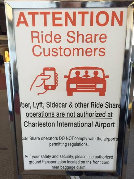 josephmessina's tweet photo. @CHS_Airport Remove the anti ride share sign.  Our Governor wants #SC free trade.  @Uber_SC #SCneedsUber http://t.co/z9jOXDACwz