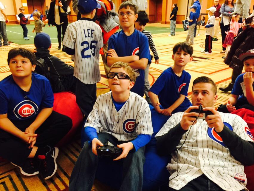 RBIGAME's tweet photo. Hanging out with @mike_olt at #CubsConvention play 2p couch mode with the fans #rbi14 http://t.co/ULR6xgcJXJ