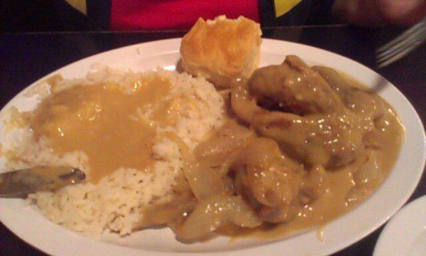 Smothered chicken. Messy, but delicious. (Photo by Juan G.)