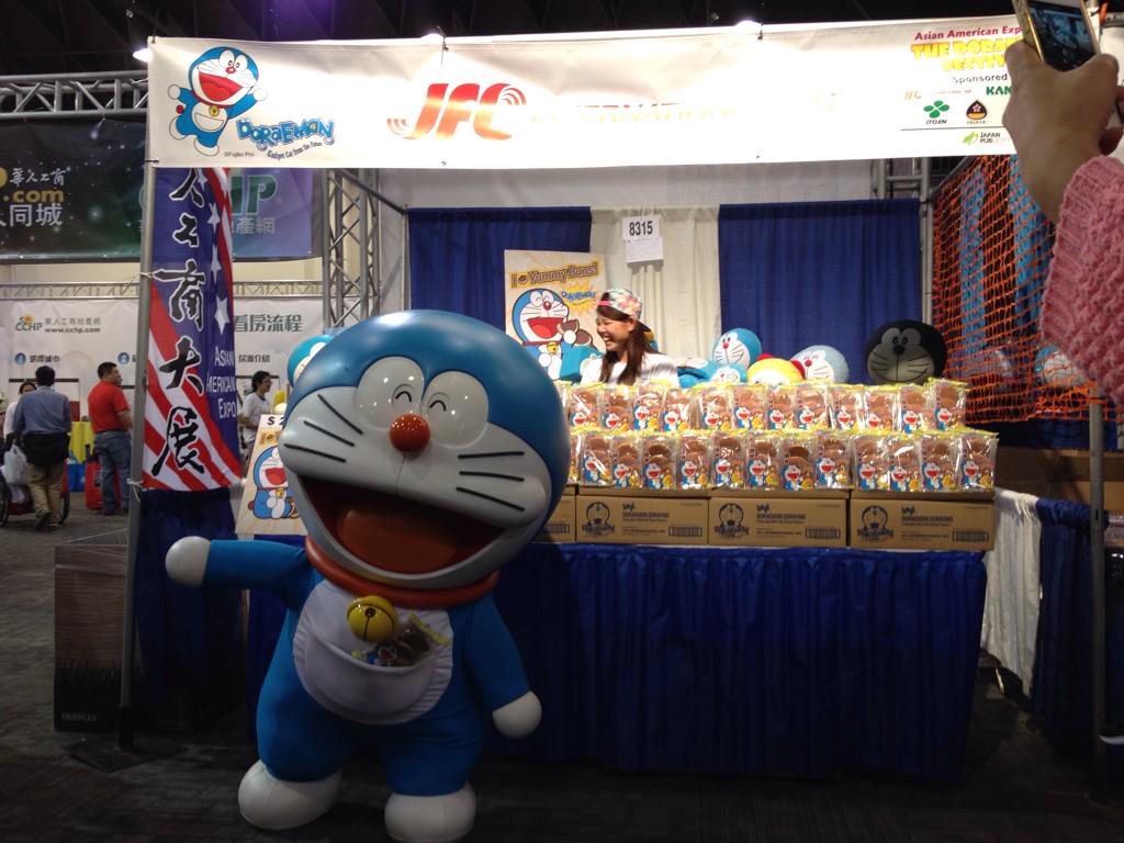 CompassX2's tweet photo. #Doraemon loving his #dorayaki at #JFC booth in hall 8 at the #AsianAmericanExpo :) Look at his pocket! http://t.co/ZpWBpeRoxD