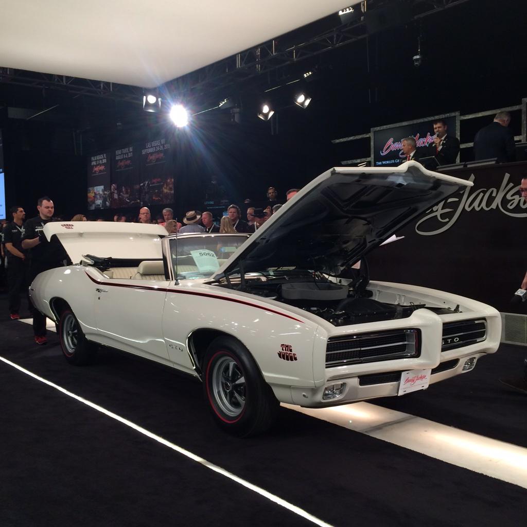 Barrett_Jackson's tweet photo. Here come the Judge! Lot #5062 1969 #Pontiac #GTO Judge hammers for $165k.  #BarrettJackson http://t.co/gGuLnpoD5D
