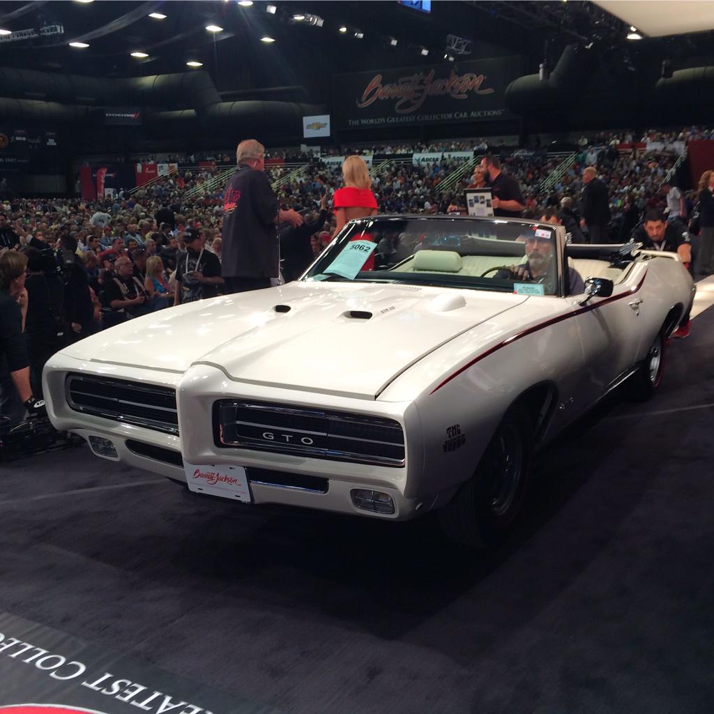 Barrett_Jackson's tweet photo. Here come the Judge! Lot #5062 1969 #Pontiac #GTO Judge hammers for $165k.  #BarrettJackson http://t.co/gGuLnpoD5D