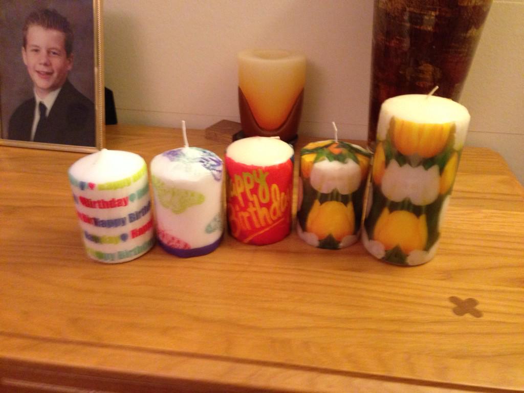 Decorative candles using napkins, plain candles and a hot iron!!