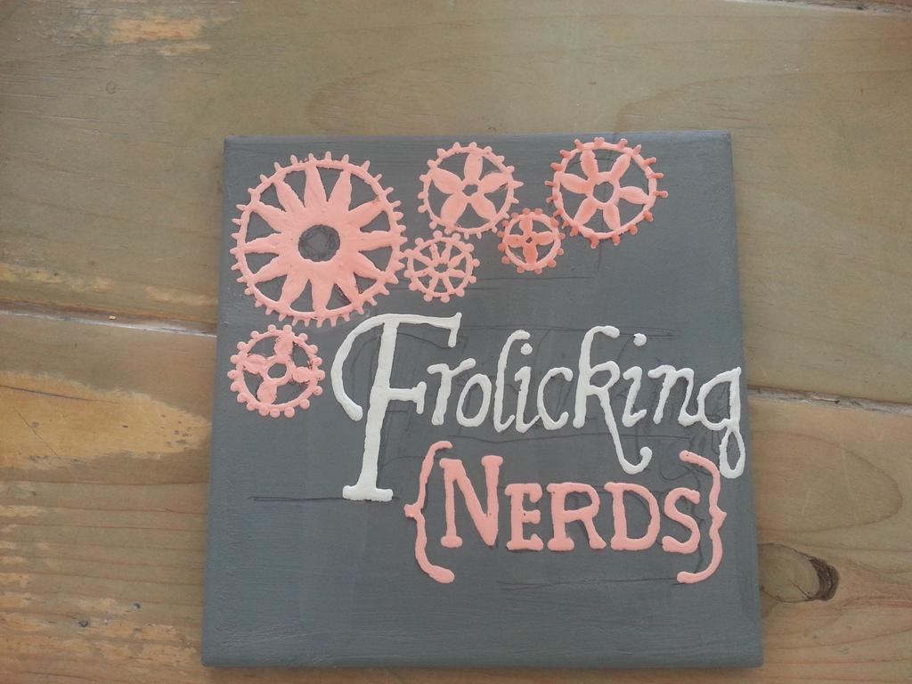 DonnaKottler's tweet image. Ready to be fired - team logo on a ceramic tile - flowered gears #FTC @FTC_TeslaLeague @FTCTeams @Frolickingnerds