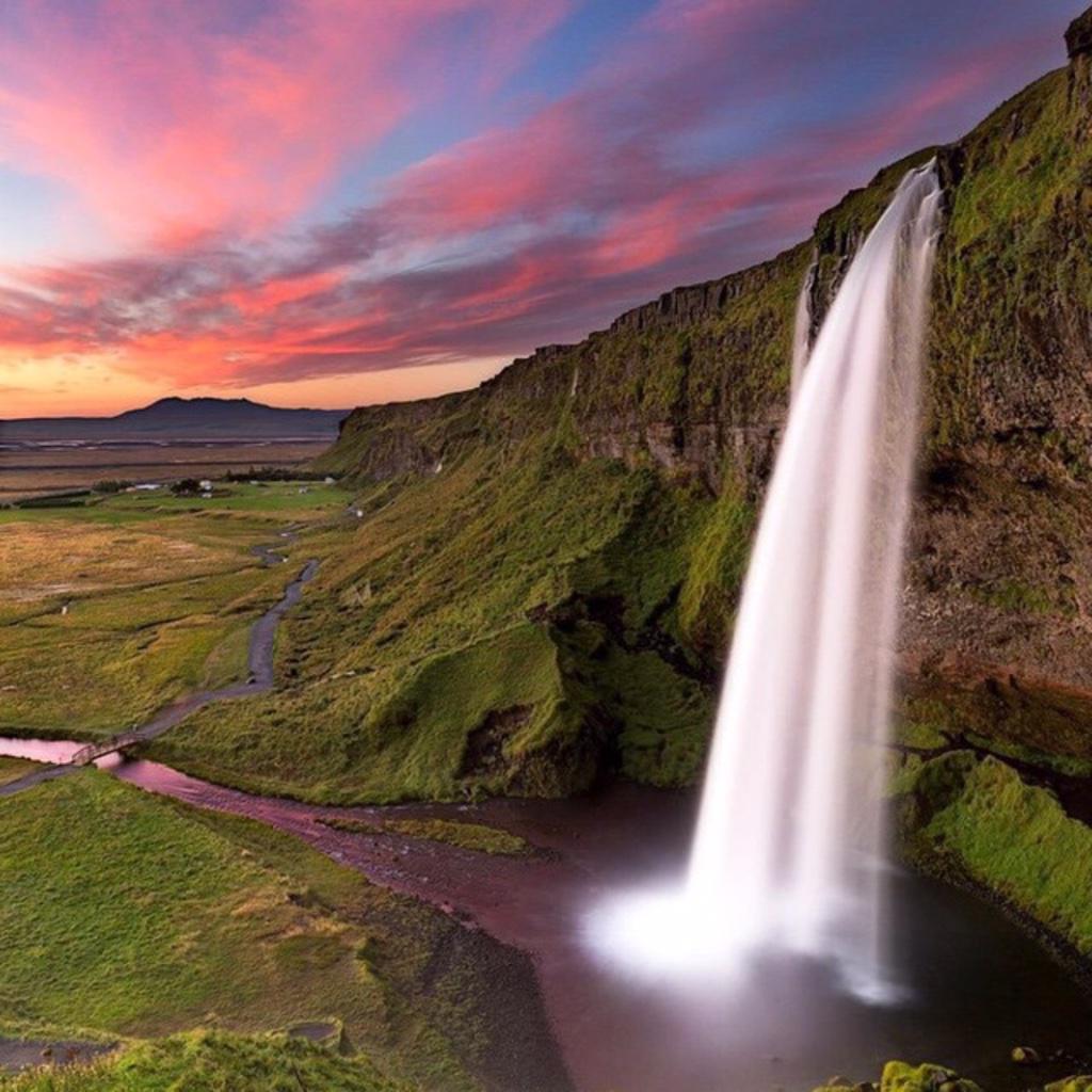 everydayiceland's tweet photo. Sunset on the Seljalandsfoss waterfall by @raoul79 💜 #everydayiceland #iceland #ísland #islandia http://t.co/8CjlCXwYCm