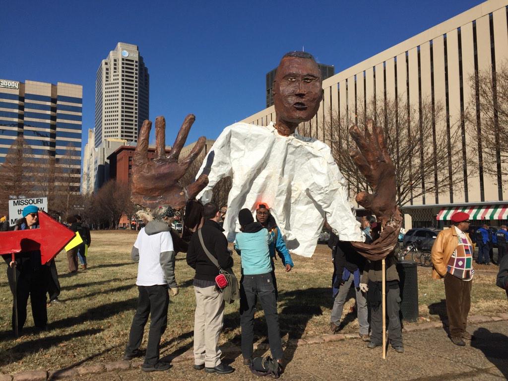 Rebelutionary_Z's tweet photo. #MikeBrown puppet makes an appearance at the #TakebackMLK March #STL -March begins at 11amCDT http://t.co/IpUnLsffK0