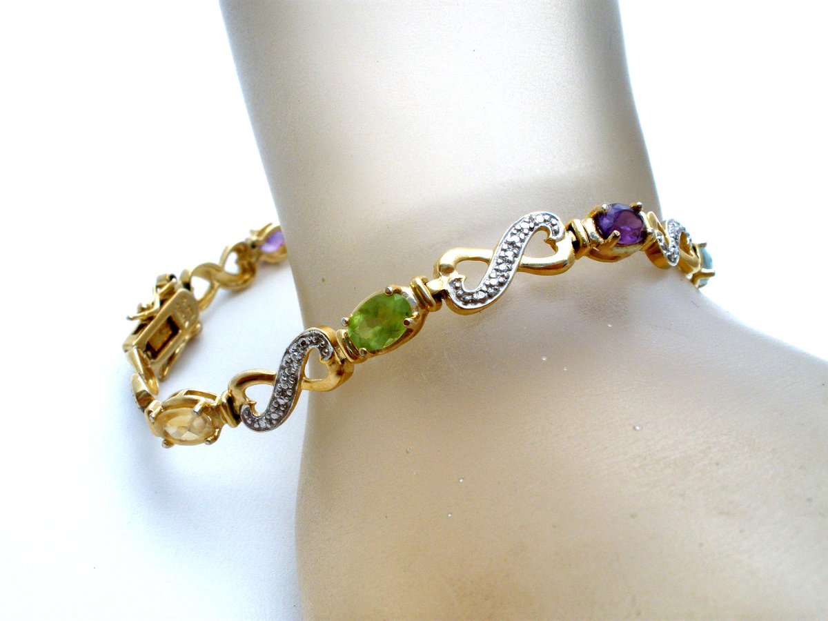 JewelryLadyChic's tweet photo. Gemstone bracelet at The Jewelry Lady's Store http://t.co/f6KS2sLFse? #gotvintage #amethystbracelet #periodot #topaz http://t.co/CD2MMuVPct