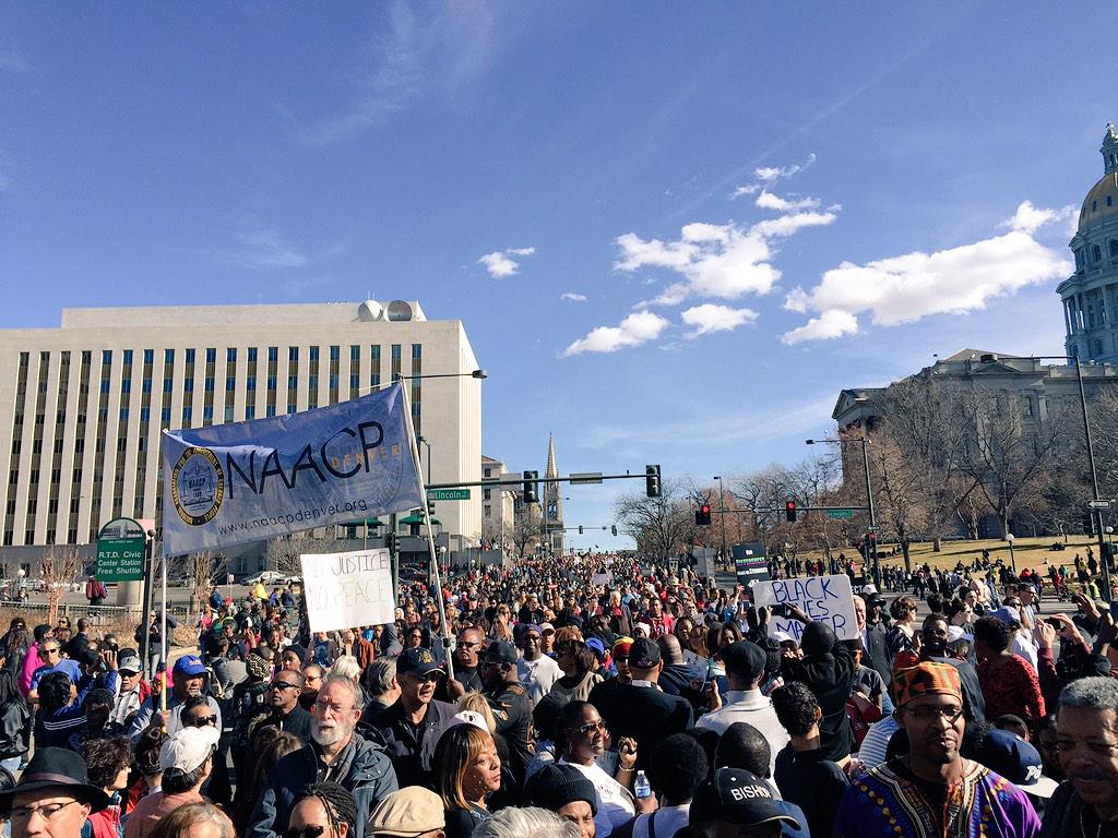 AlbusBrooks's tweet photo. This is what the nations largest #MLK gathering looks like. 40K in attendance #MLKDenver @DowntownDenver http://t.co/tIaSgrsb2F