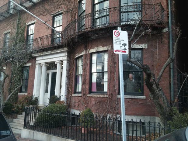 Fara1's tweet photo. Beacon Hill resident looks out window at protesters, wonders what's so wrong with the world ...  #4MileMarch http://t.co/Ern8bife6h