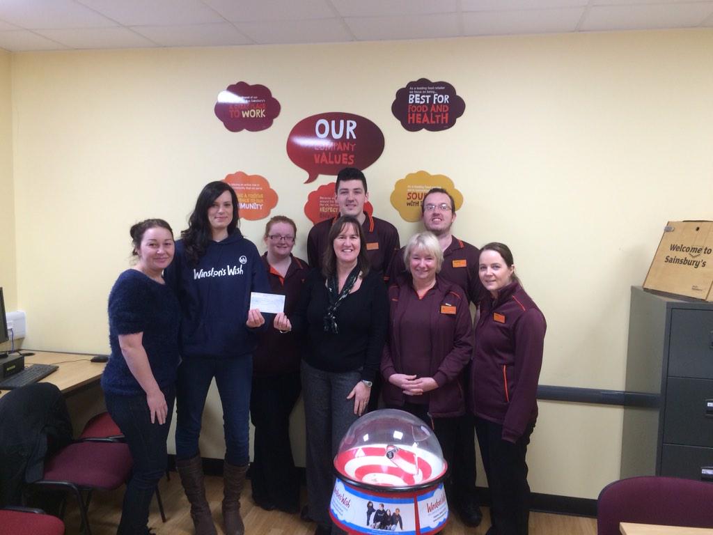 PaulS_WH's tweet photo. Leigh colleagues were happy to give @winstonswish a cheque for over £1300 for funds raised over Christmas #Sainsburys http://t.co/VMgHqis3XJ