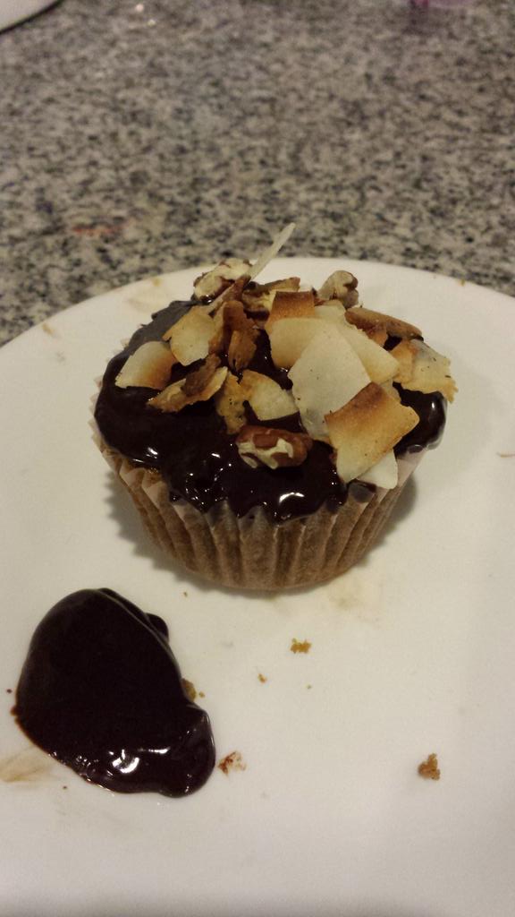 laurazleo's tweet photo. Oatmeal cupcakes with chocolate ganache topped with toasted coconut and pecans. Love my vintage cakes cookbook! http://t.co/qatFEFMaHf